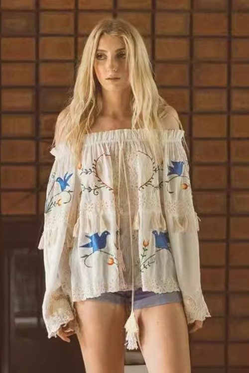 Flower embroidered hollow fringed one-shoulder large trumpet sleeve shirt top